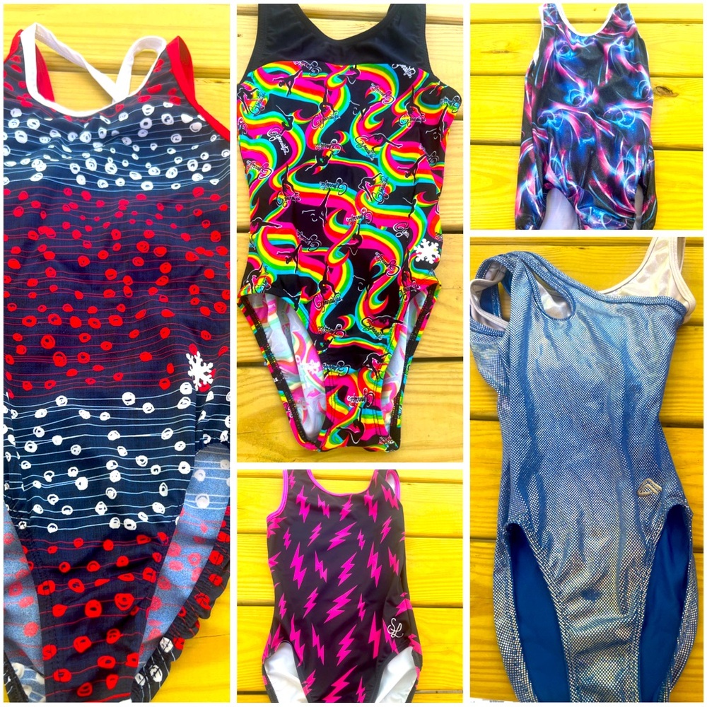 Sold on cross post AXS gymnastics leotards
